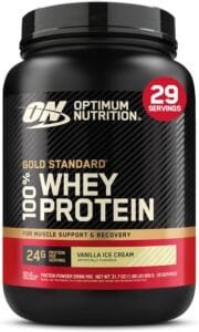 Pote preto com detalhes em vermelho e dourado do suplemento Optimum Nutrition Gold Standard 100% Whey sabor Vanilla Ice Cream (899g), classificado entre os melhores whey protein em 2026. O rótulo destaca o logo da marca "ON", a oferta de 24g de proteína por porção e o rendimento de 29 doses.